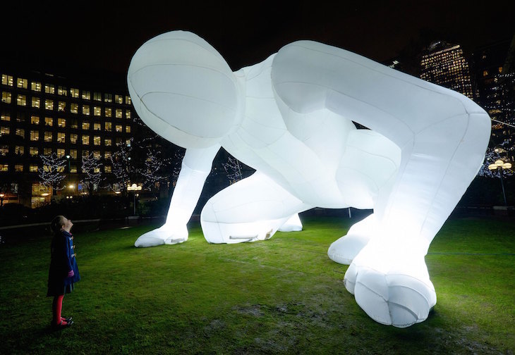 EDITORIAL USE ONLY Ava, 8, from Tower Hamlets looks at Fantastic Planet by Amanda Parer as it illuminates Westferry Garden in Canary Wharf, London, as part of the Winter Lights Festival 2016, which opens free to the public today and runs until 22nd January. PRESS ASSOCIATION Photo. Picture date: Monday January 11, 2016. Photo credit should read: Frantzesco Kangaris/PA Wire
