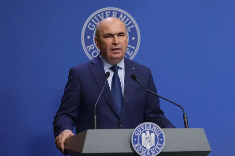 Bolojan promite că nu vor crește TVA-ul sau taxele în 2026, dar urmează tăieri dure în administrație Bolojan promite că nu vor crește TVA-ul sau taxele în 2026, dar urmează tăieri dure în administrație